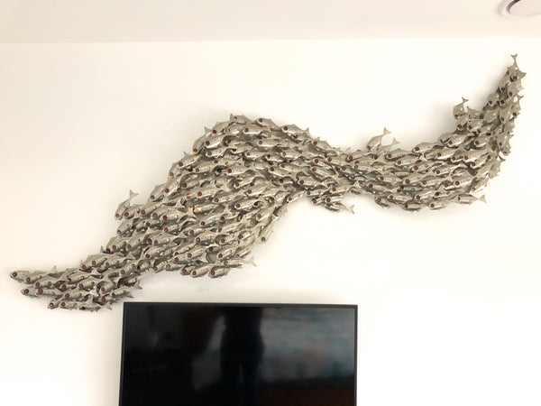 undulating Silver Baitfish school